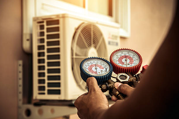 Professional Hvac technician working in Greenville, NC